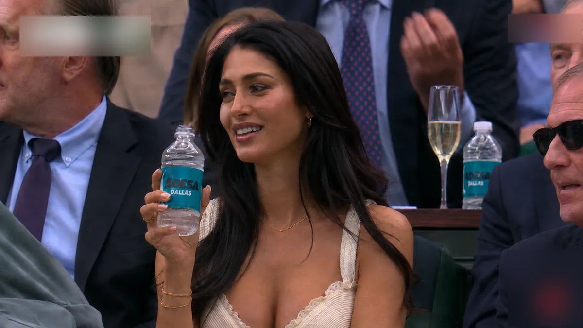 Custom labeled bottled water being used at a live event